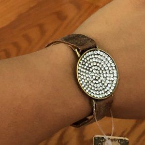 leather-strapped bracelet